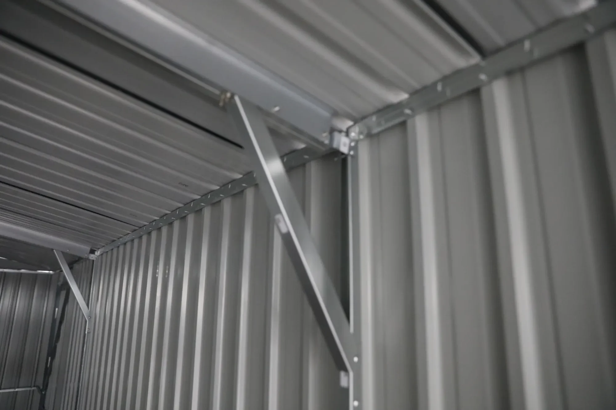 10x20-ft-single-car-metal-garage-scene-2-1